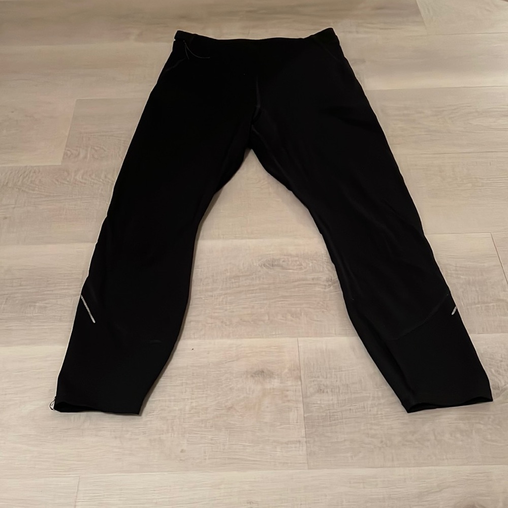 This is a cropped black legging.